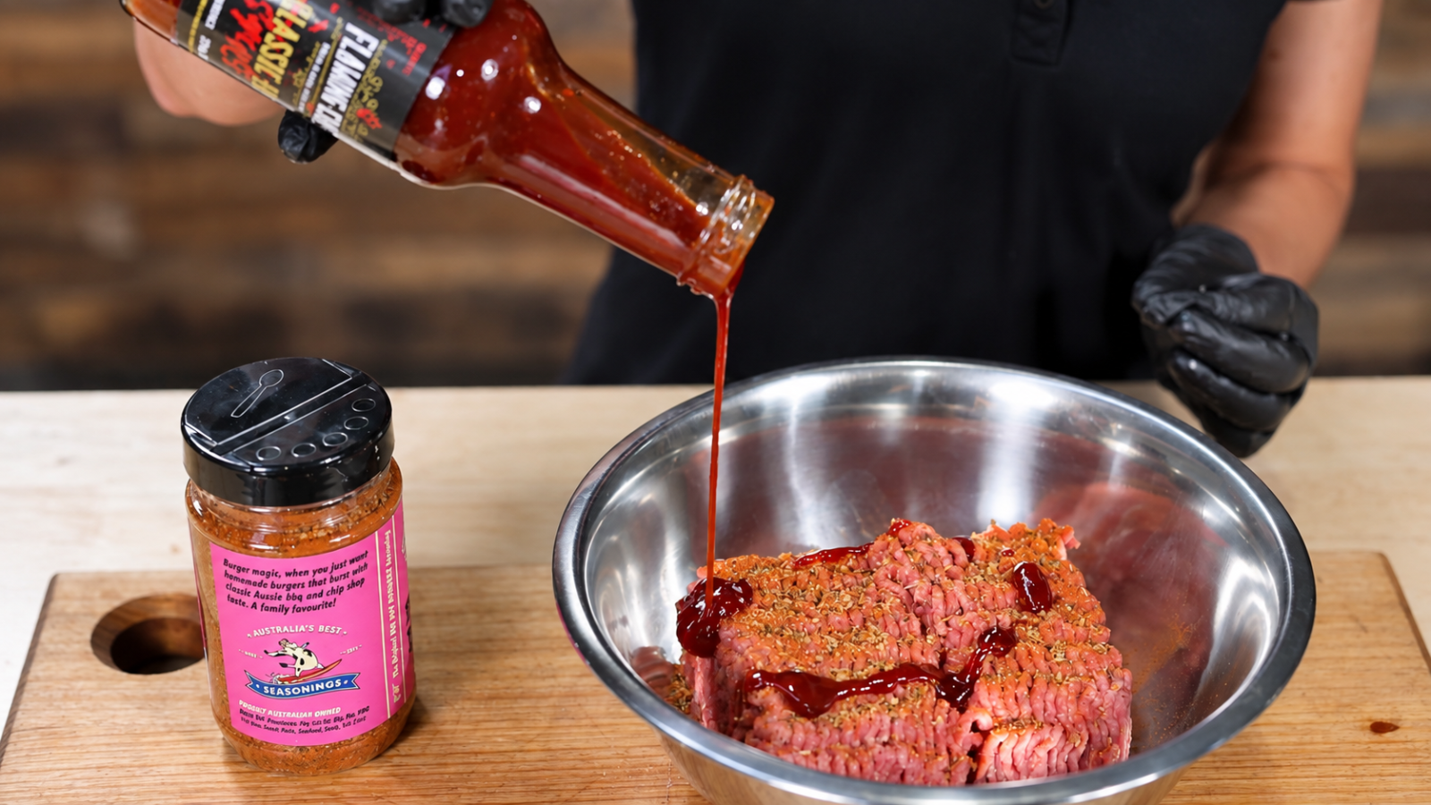 This image shows ground beef with seasoning and sauce mixed. This image shows ground beef with seasoning and sauce mixed.