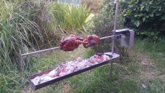 This image shows the Auspit Rotisserie with the Fire Tray. This image shows the Auspit Rotisserie with the Fire Tray.