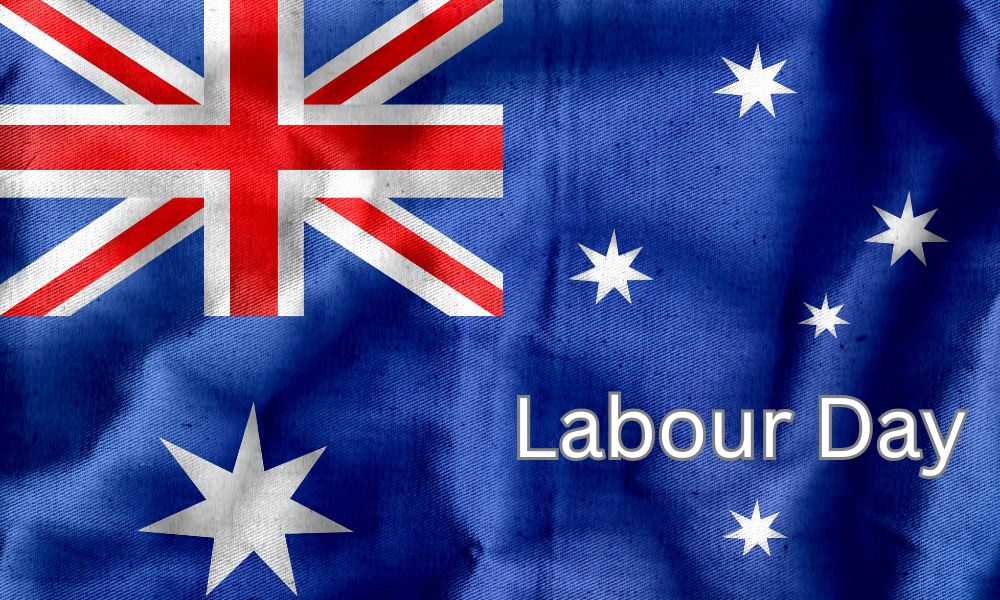 Australian flag background with Labour Day text overlay. Australian flag background with Labour Day text overlay.