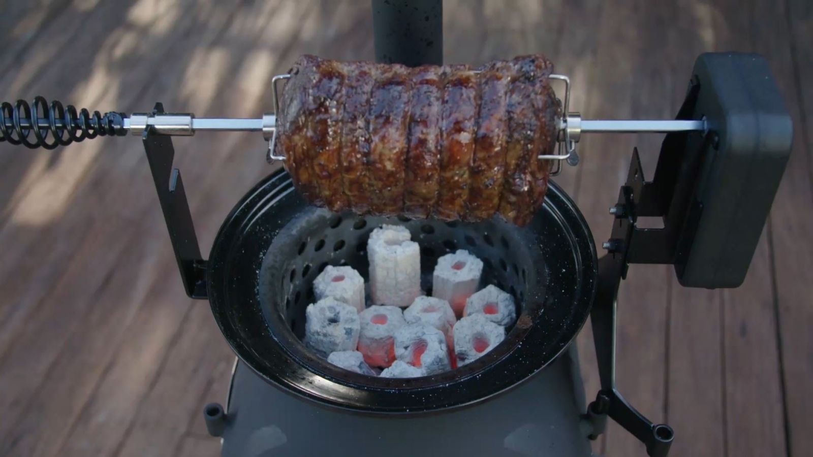 This is an image on a spit roast being cooked on top of an ozpig