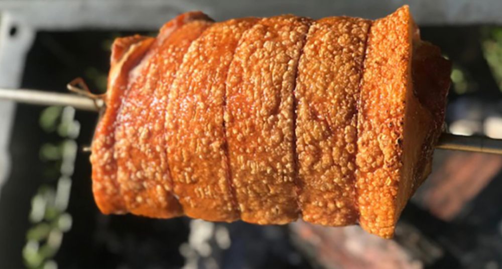 Pork crackling roast on Auspit rotisserie.