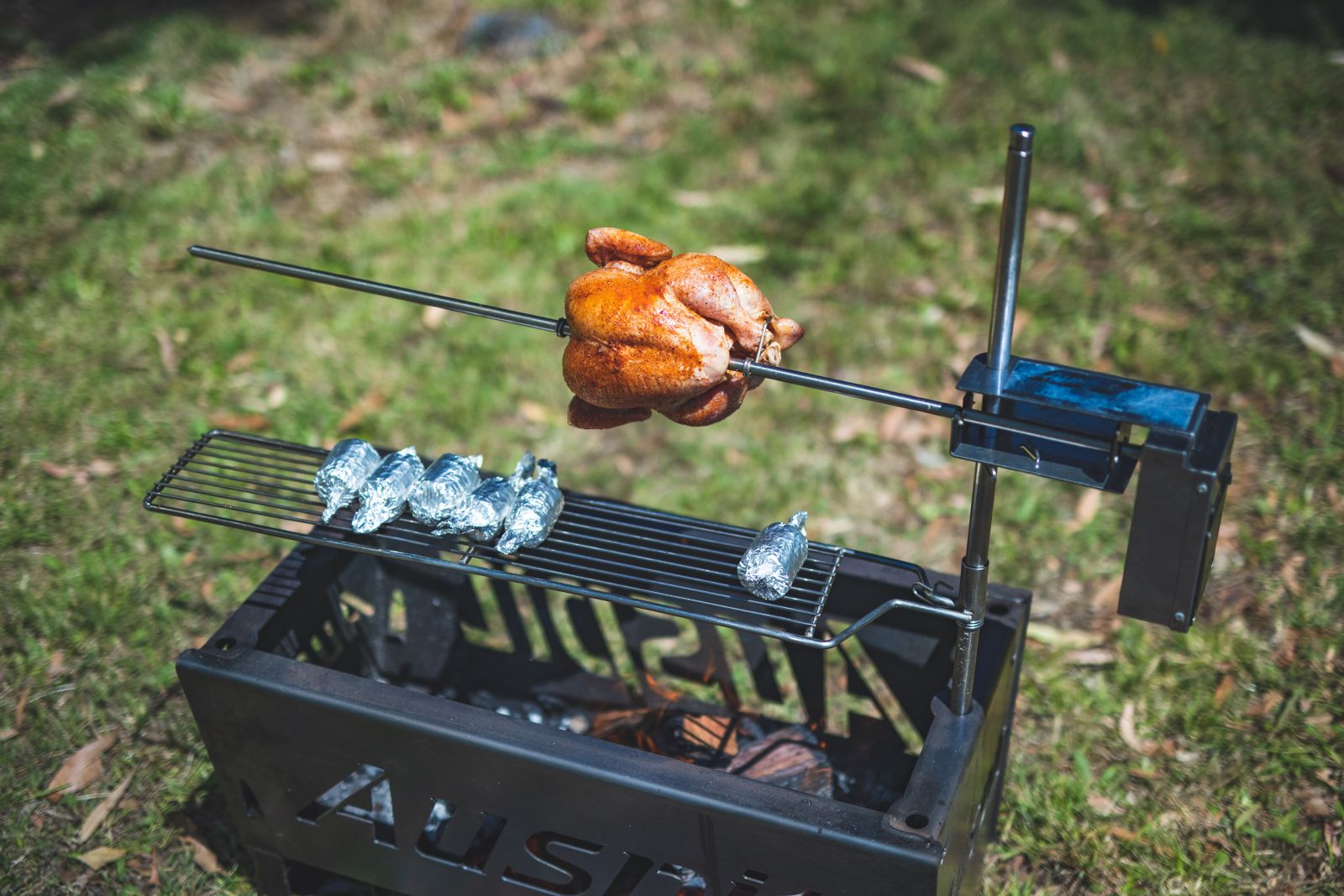 This image shows chicken being cooked in an Auspit
