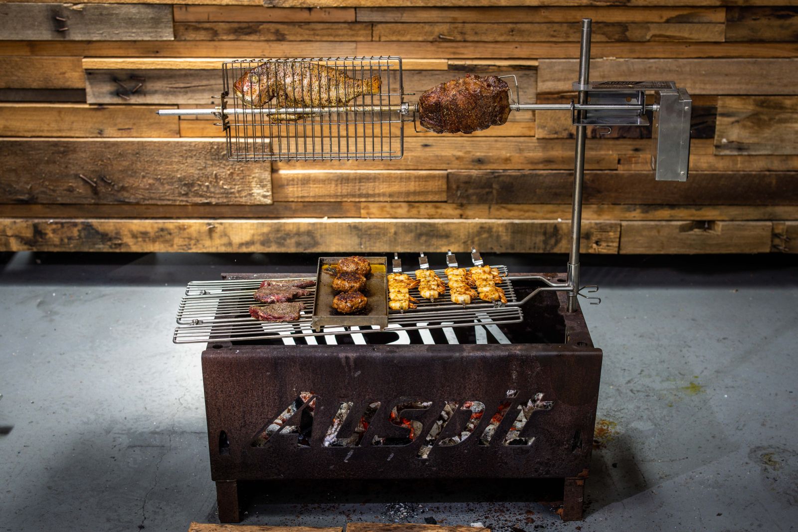 This image shows the Auspit Rotisserie Kit. This image shows the Auspit Rotisserie Kit.