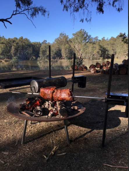 This_image_shows_Auspit_Gold_Portable_Rotisserie_being_used_in_Camping 