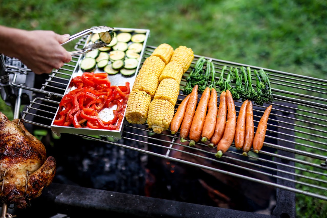 This_image_shows_veggies_being_cooked_on_Auspit_Rotisseries